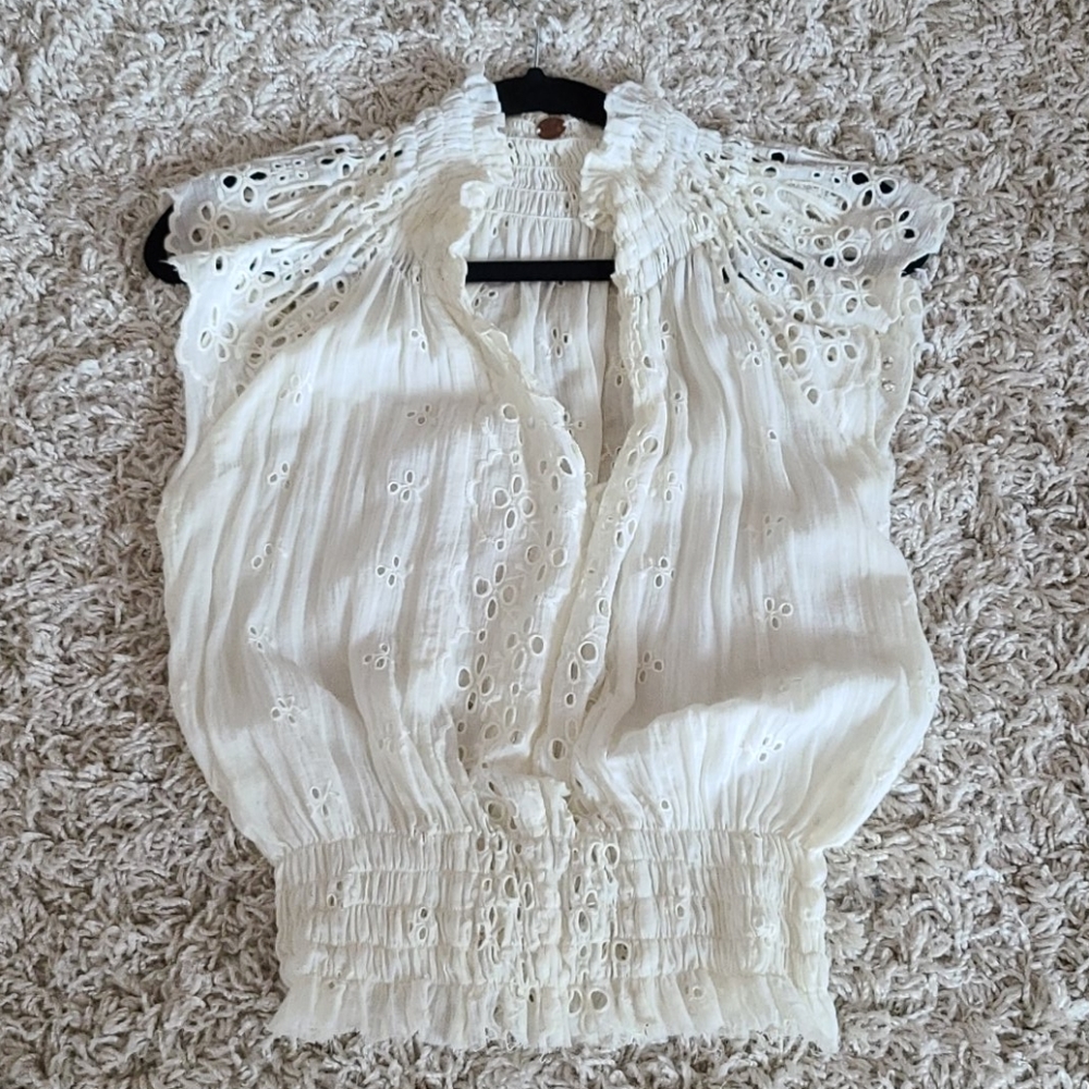 Embroidered top by Free People.